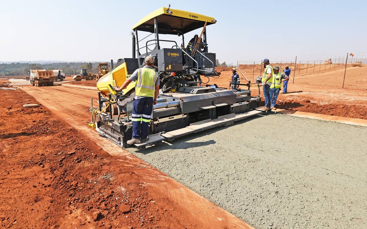 Base course laying with a paver